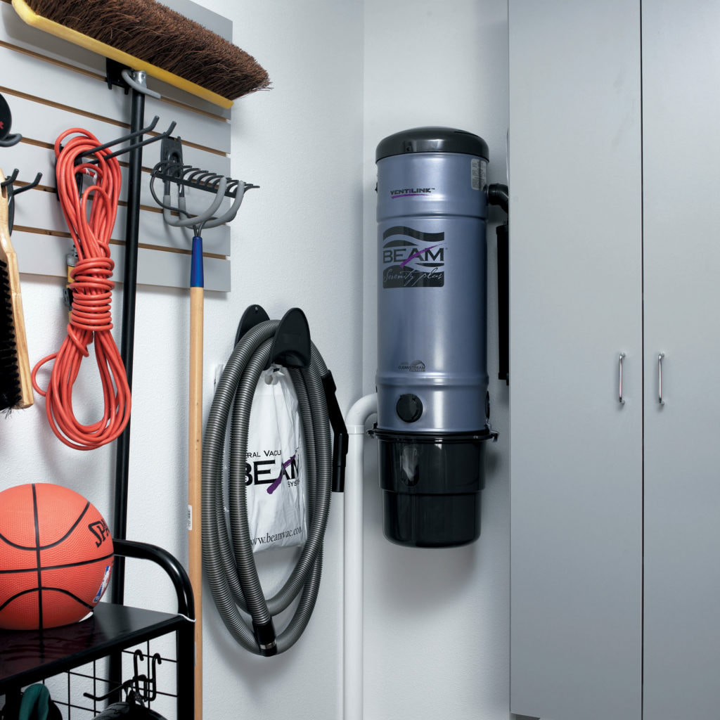 VacuuPro central vacuum power unit mounted in a utility room